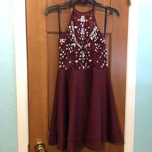 Maroon sequined B Darlin halter dress.
